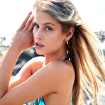 Pic of Nicole Suede Takes off her Shiny Bikini