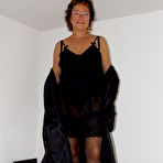 Pic of German mature housewife with hot ass and hairy pussy stripping and getting naughty - Mature.nl