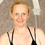 Pic of Mature blonde amateur Suzie Stone exposes her big boobs and rides a toy - NakedPics