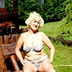 Pic of Granny Has Fun Naked In The Back Garden &ndash; UK Wives Pics