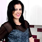 Pic of Brunette Housewife With Fat Bum Strips In The Kitchen – UK Wives Pics