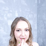 Pic of   Nika turns around and bends over and fingers her pussy for the camera | Baberotica