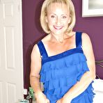 Pic of Cougar Michelle stakes off her underwear and shows her landing strip pussy &ndash; Bare Milfs