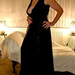 Pic of Amateur Milf with huge tits wearing a 6 strap suspender belt and seamed stockings bent over the bed &ndash; Bare Milfs