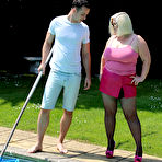 Pic of Fat Milf dressed like a tart drops to her knees and sucks the pool boy off & even lets him spread her legs and push his cock inside her cunt &ndash; Bare Milfs