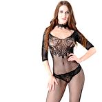 Pic of Solo model Mikki works free of a crotchless bodystocking in heels | NakedWomenPhotos.net