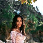 Pic of Putri Cinta drops her white fishnet dress at the beach showcasing big boobs