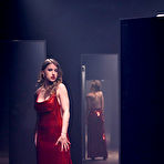Pic of Octavia Red surrounded by mirrors and a big dick in this kinky scene