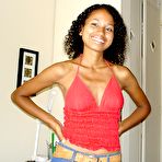 Pic of Petite brown-skinned Brazilian beauty models a whopping face full of jizz