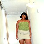 Pic of Well-hung dark mature posing before cameraman