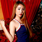 Pic of Redheaded Asian beauty Farin takes a dildo to her vagina during solo action
