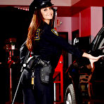 Pic of Top heavy policewoman Ava Addams strips naked for pussy spreading