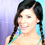 Pic of Cute teen Kenzi Marie shows off her barely legal pussy in pigtails and socks