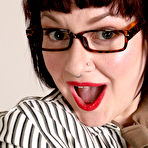 Pic of Mature secretary Satine highlights her big ass after going nude in glasses