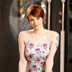 Pic of Short haired redhead in pink panties unveiling full all natural breasts