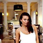 Pic of Young brunette shows her butterfly labia lips after getting naked on rug