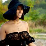 Pic of Brunette teen Alika Penagos slips a couple of fingers in her cunt in the nude