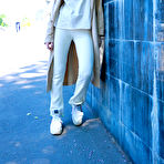 Pic of Charming teen Florens flashes in an overcoat before getting naked
