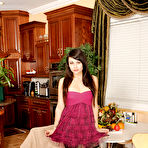 Pic of Perky latina amateur getting rid of her fancy clothes and black nylons