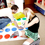 Pic of Foxy teen enjoys a twister play turning into passionate pussy pounding