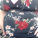 Pic of Pregnant redhead Georgia Peach takes her dress off and poses naked on the sofa