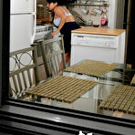 Pic of Pregnant Latina chick masturbates on top of a portable dishwasher