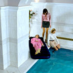 Pic of Fully clothed fetish ladies having some wet fun in the pool