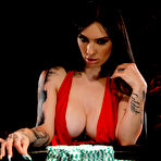 Pic of Inked female Misha Montana takes a cumshot in her mouth after losing at poker