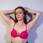 Pic of Redheaded chick Lexa Reed sports mesh nylons during sex with her man friend