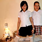 Pic of Young Asian schoolgirls do a threesome with a small cock in OTK nylons