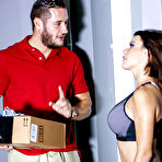 Pic of Horny brunette Peta Jensen displaying hooters while fucking delivery man