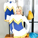 Pic of Cheerleader babe Crista Moore is stripping to show her amazing ass