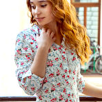 Pic of Young redhead Ness gets completely undressed on top of her bed