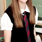 Pic of Cute schoolgirl with sexy legs Lara Brookes stripping in the classroom