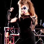 Pic of Female rockers get together for a non-nude shoot on a stage