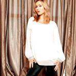 Pic of British beauty Summer St Claire uncovers her nice tits before showing her ass