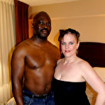 Pic of Caucasian woman Tiffany Lynne engages in interracial sex on top of her bed