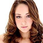 Pic of Solo model Remy La Croix hikes up her latex dress to expose her bare ass