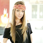 Pic of Young bandanna adorned pornstar Remy Lacroix flashing small teen tits