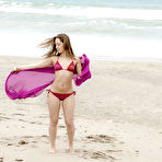 Pic of Amazing wet babe Remi showing that beautiful body on the beach