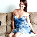 Pic of Horny brunette cutie undressing and toying her sweet shaved pussy