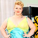 Pic of SSBBW Velma Voodoo removes satin lingerie before being fondled and dildoed