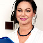 Pic of Over 30 brunette Victoria West strips down to her stockings and high heels