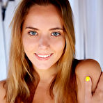 Pic of Totally naked teen Mango A spreads her long legs to show her yummy pussy