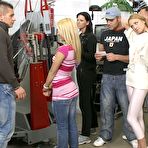 Pic of College girls have group sex with willing guys inside an auto garage