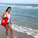 Pic of Amateur girlfriend  Sasha enjoys stripping and fingering on the beach