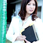Pic of Japanese woman Jun Sena exposes her cleavage while dressed for office work