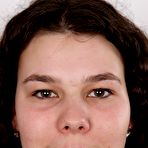 Pic of Amateur girl with long wavy hair takes off all her clothes during solo action