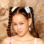 Pic of Tiny Asian girl Amai Liv showcases her tight pussy after a striptease