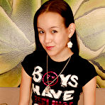 Pic of Barely legal Asian spinner Amai Liu posing fully clothed before stripping